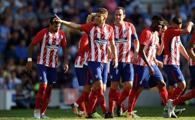 Los jugadores del Atlético celebran un gol.