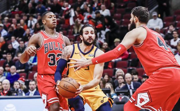 Ricky Rubio y Nikola Mirotic, durante el partido. /Efe