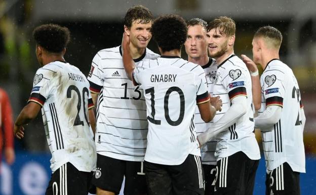 The players of the German team celebrate one of the four goals. 