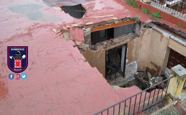 The collapsed roof of a central building in Murcia.