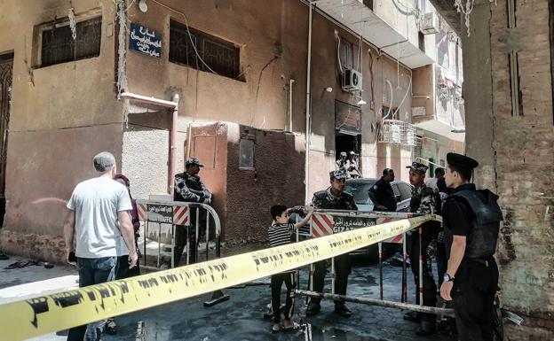Police cordon off access to the burned church in Giza. 