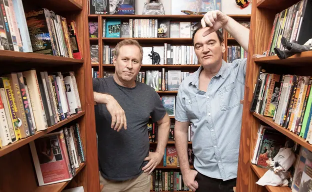 Tarantino and Avary surrounded by the VHS tapes from their collection