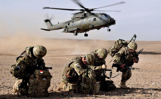 British soldiers arrive in Afghanistan's Helmand province in 2010. 