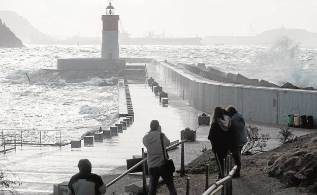 Large waves hit the Christmas Lighthouse in Cartagena, in a file image.